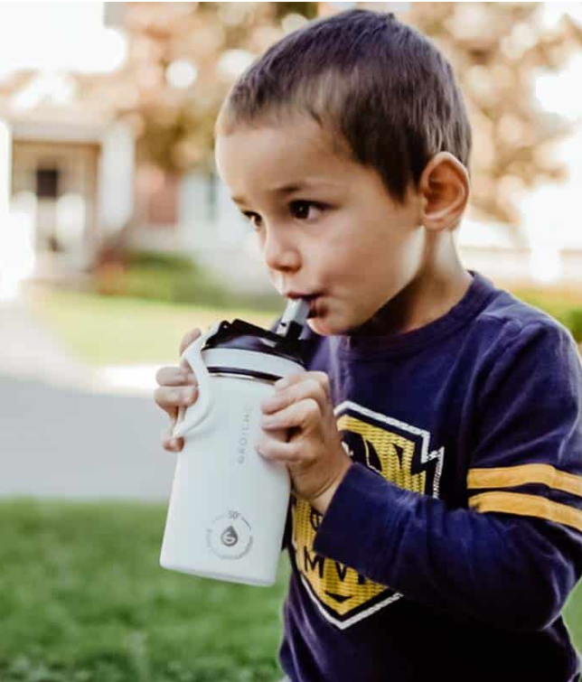 little boy with Lil Chill water bottle