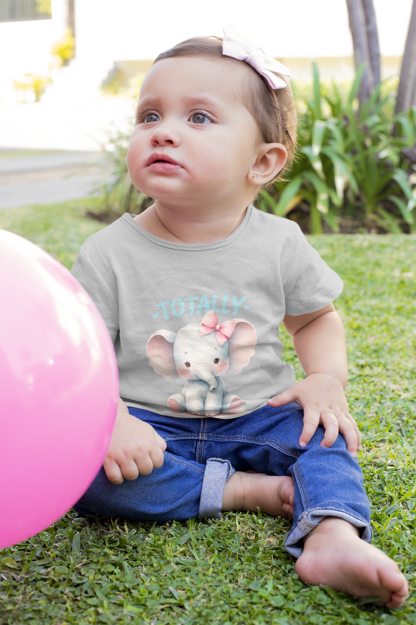 baby wearing totally adorable tee