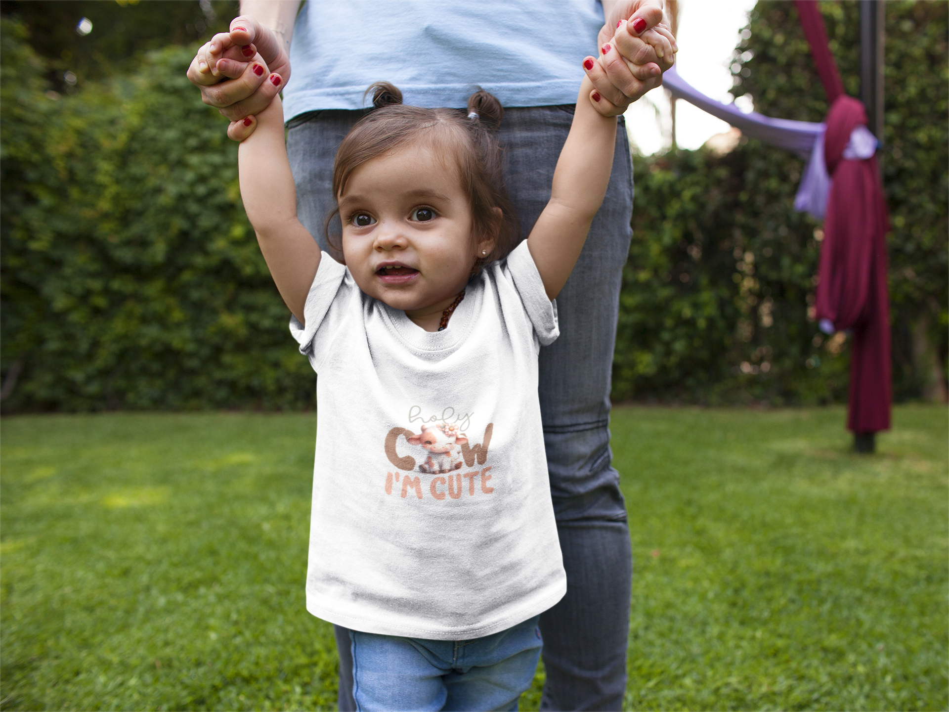 baby wearing holy cow I'm cute tee