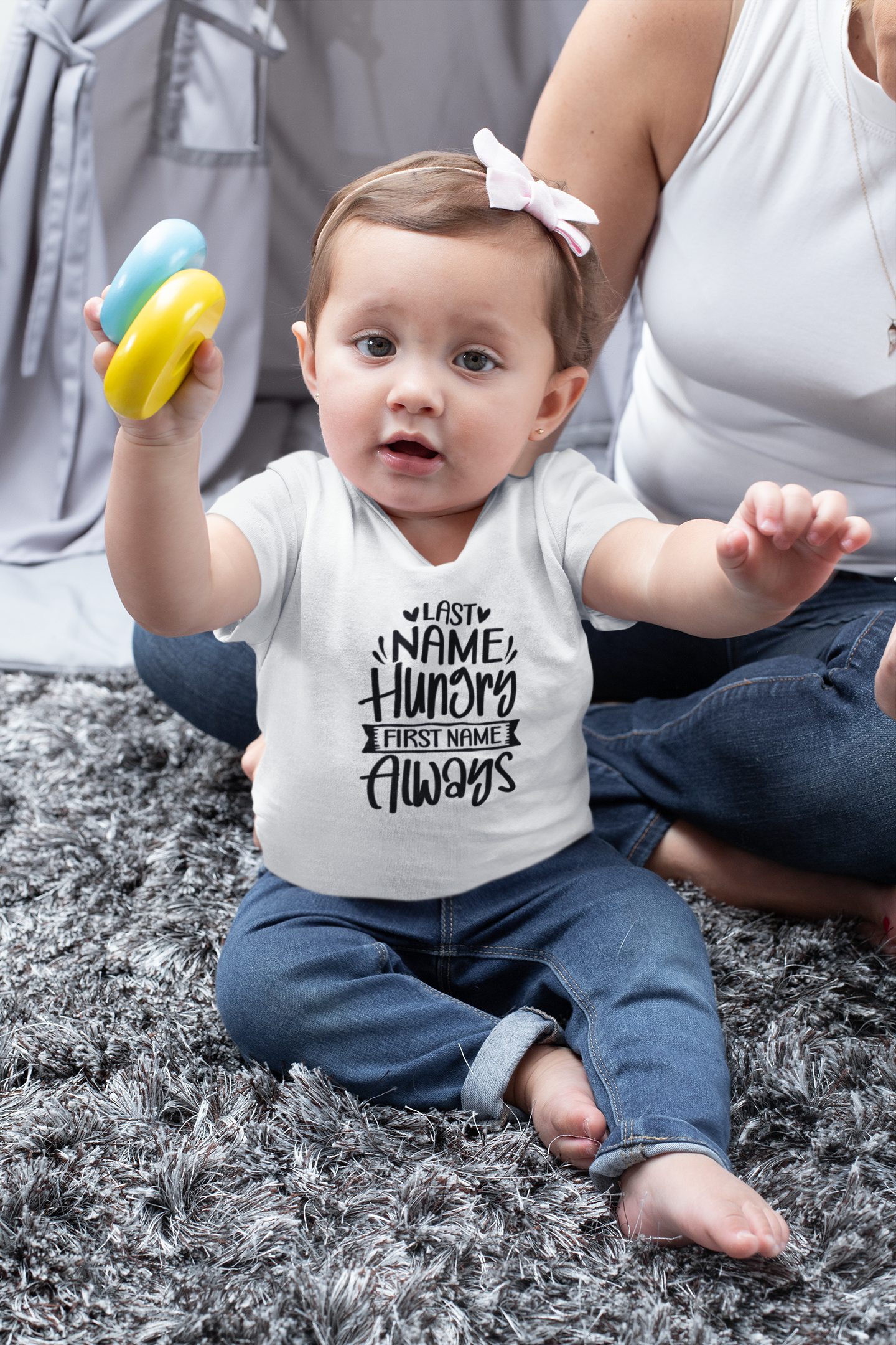 baby wearing first name hungry last name always tee