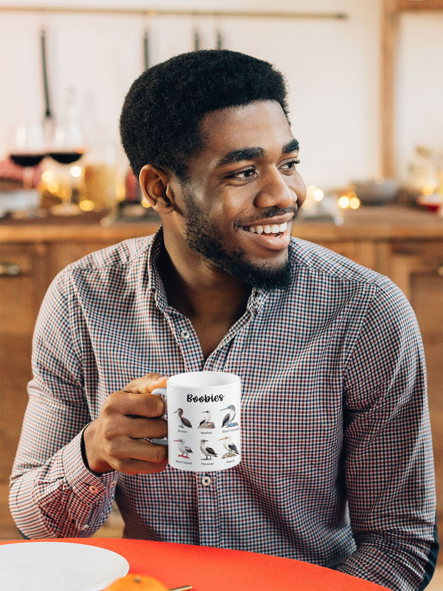 Man holding boobies coffee mug