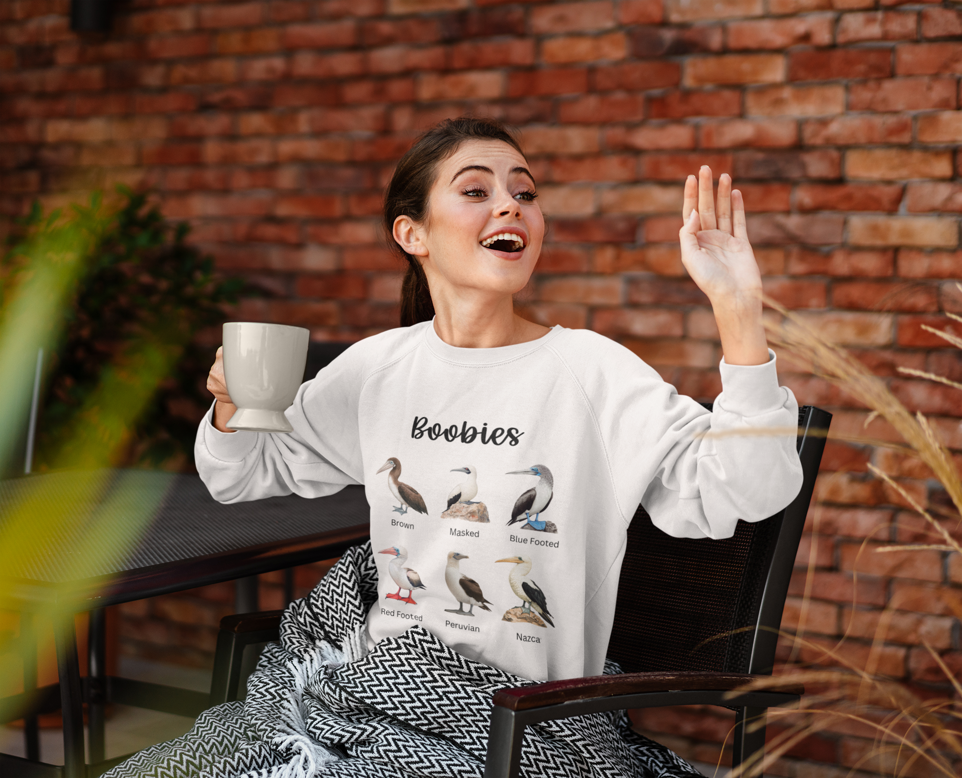 woman wearing boobies sweatshirt