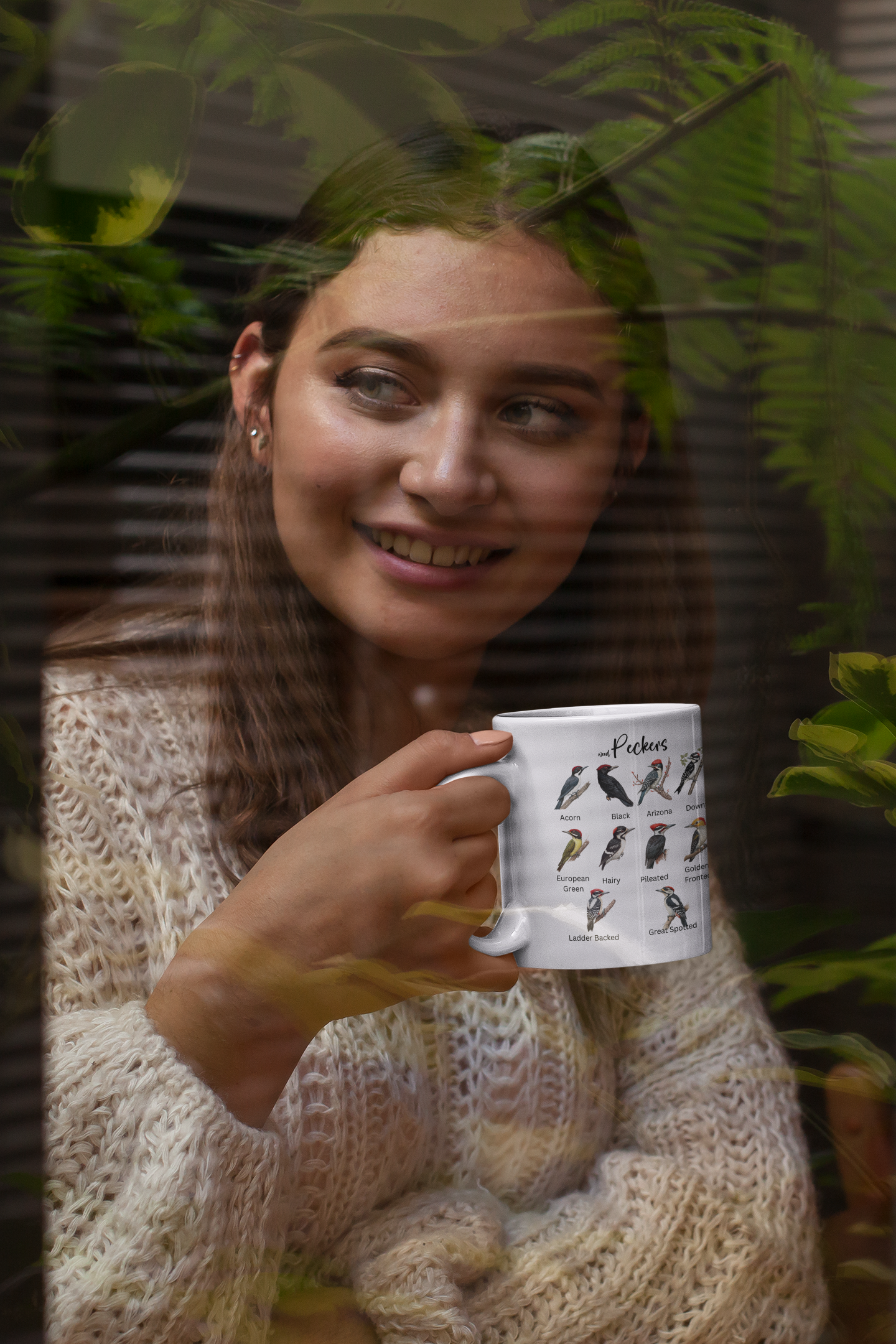 woman holding Peckers coffee mug